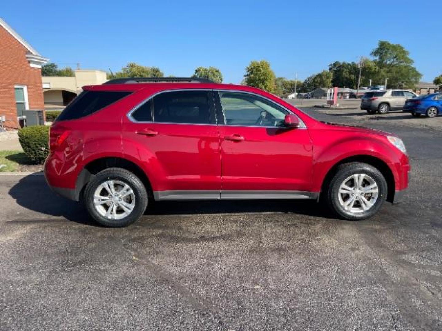 2015 Crystal Red Tintcoat Chevrolet Equinox 1LT 2WD (2GNALBEK3F1) with an 2.4L L4 DOHC 16V FFV engine, 6-Speed Automatic transmission, located at 4508 South Dixie Dr, Moraine, OH, 45439, (937) 908-9800, 39.689976, -84.218452 - Photo#5