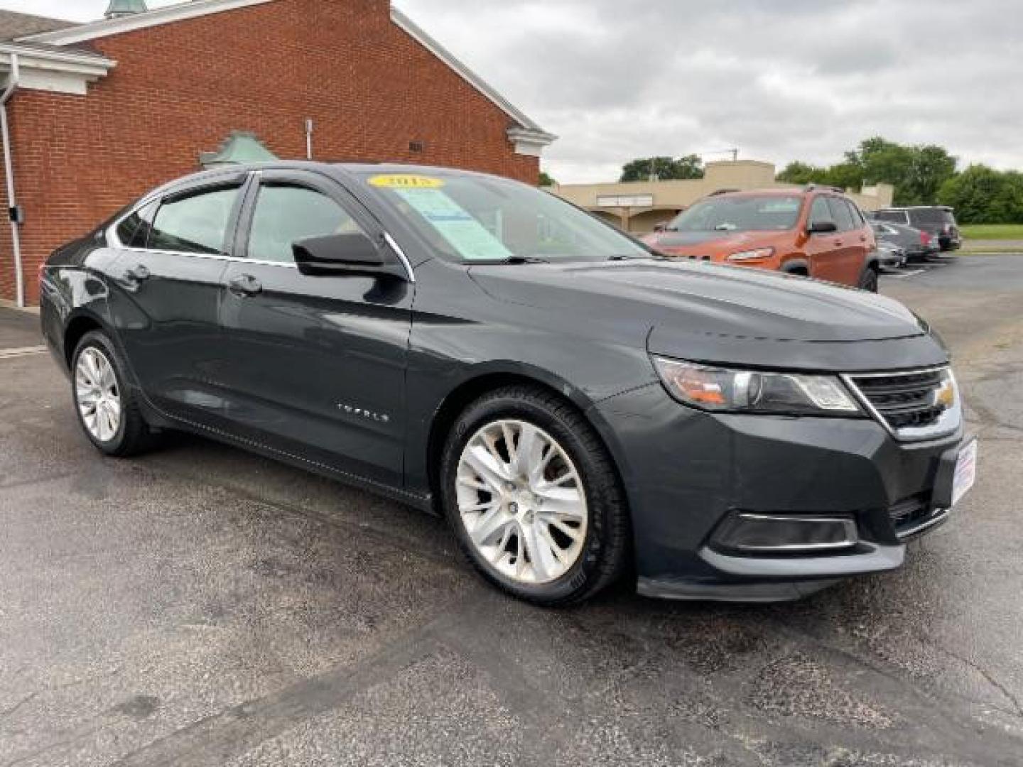 2015 Black Chevrolet Impala LS (2G11Z5SL6F9) with an 2.5L L4 DOHC 16V engine, 6-Speed Automatic transmission, located at 1099 N County Rd 25A, Troy, OH, 45373, (937) 908-9800, 40.057079, -84.212883 - Photo#0