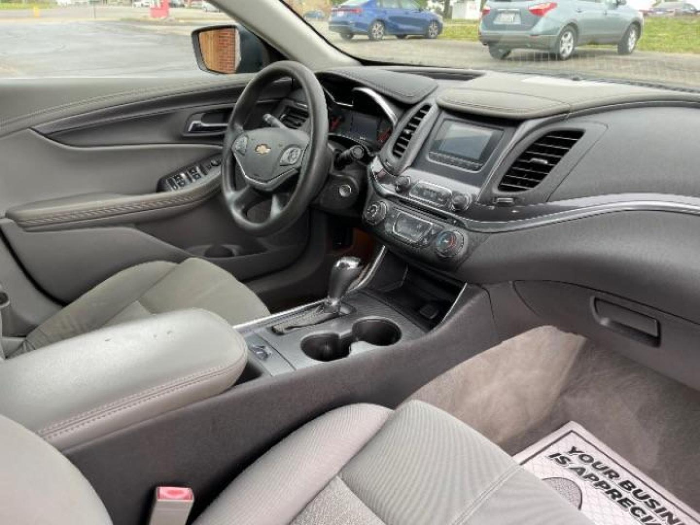 2015 Black Chevrolet Impala LS (2G11Z5SL6F9) with an 2.5L L4 DOHC 16V engine, 6-Speed Automatic transmission, located at 1099 N County Rd 25A, Troy, OH, 45373, (937) 908-9800, 40.057079, -84.212883 - Photo#8