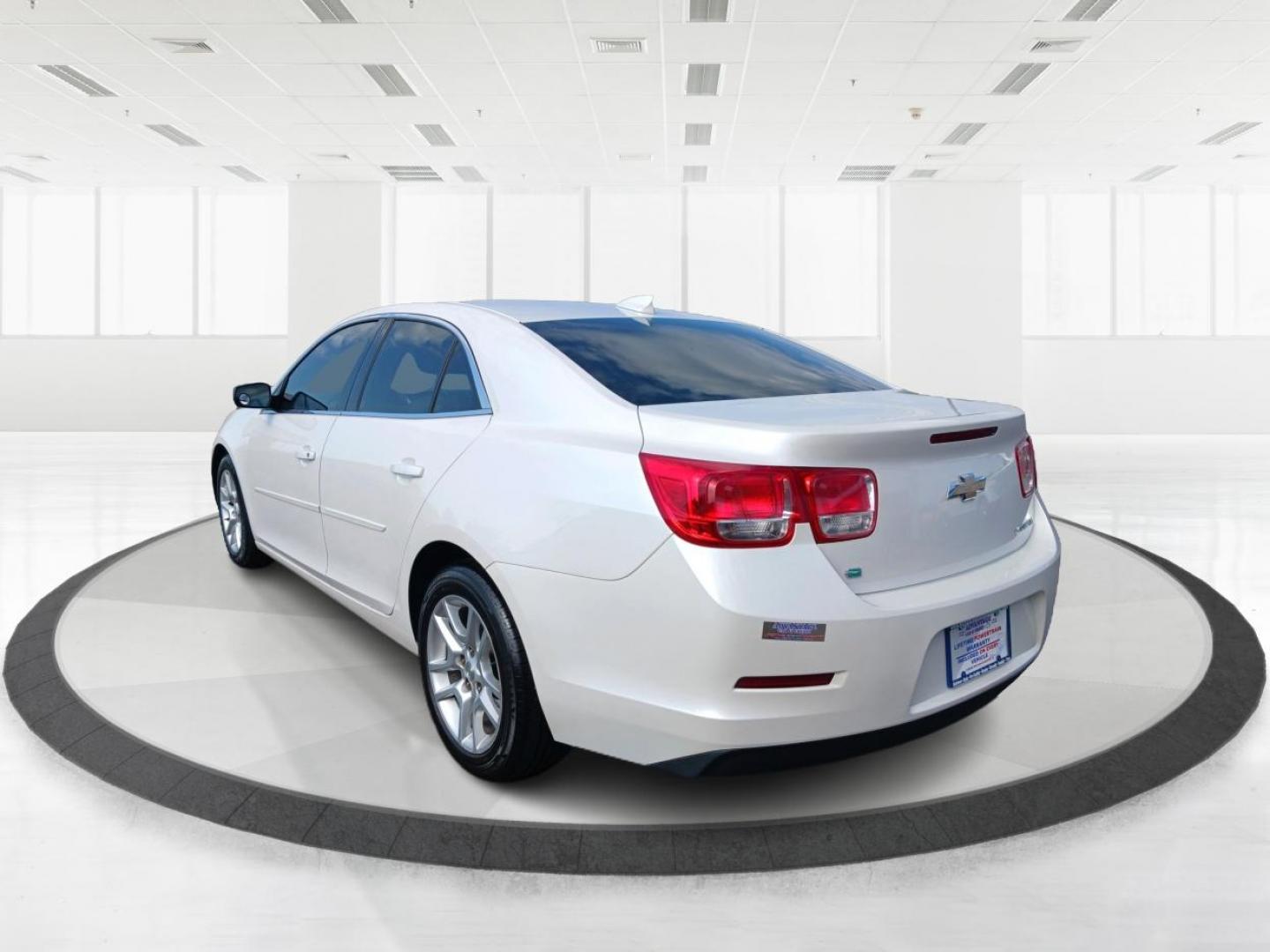 2015 Summit White Chevrolet Malibu (1G11C5SL7FF) with an 2.5L L4 DOHC 16V engine, 6-Speed Automatic transmission, located at 1184 Kauffman Ave, Fairborn, OH, 45324, (937) 908-9800, 39.807072, -84.030914 - Photo#4