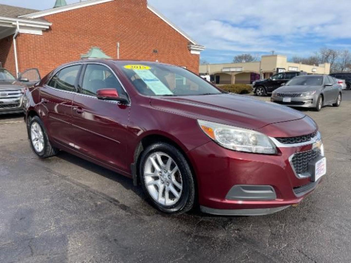 2015 Butte Red Metallic Chevrolet Malibu 1LT (1G11C5SL6FF) with an 2.5L L4 DOHC 16V engine, 6-Speed Automatic transmission, located at 1230 East Main St, Xenia, OH, 45385, (937) 908-9800, 39.688026, -83.910172 - Photo#0