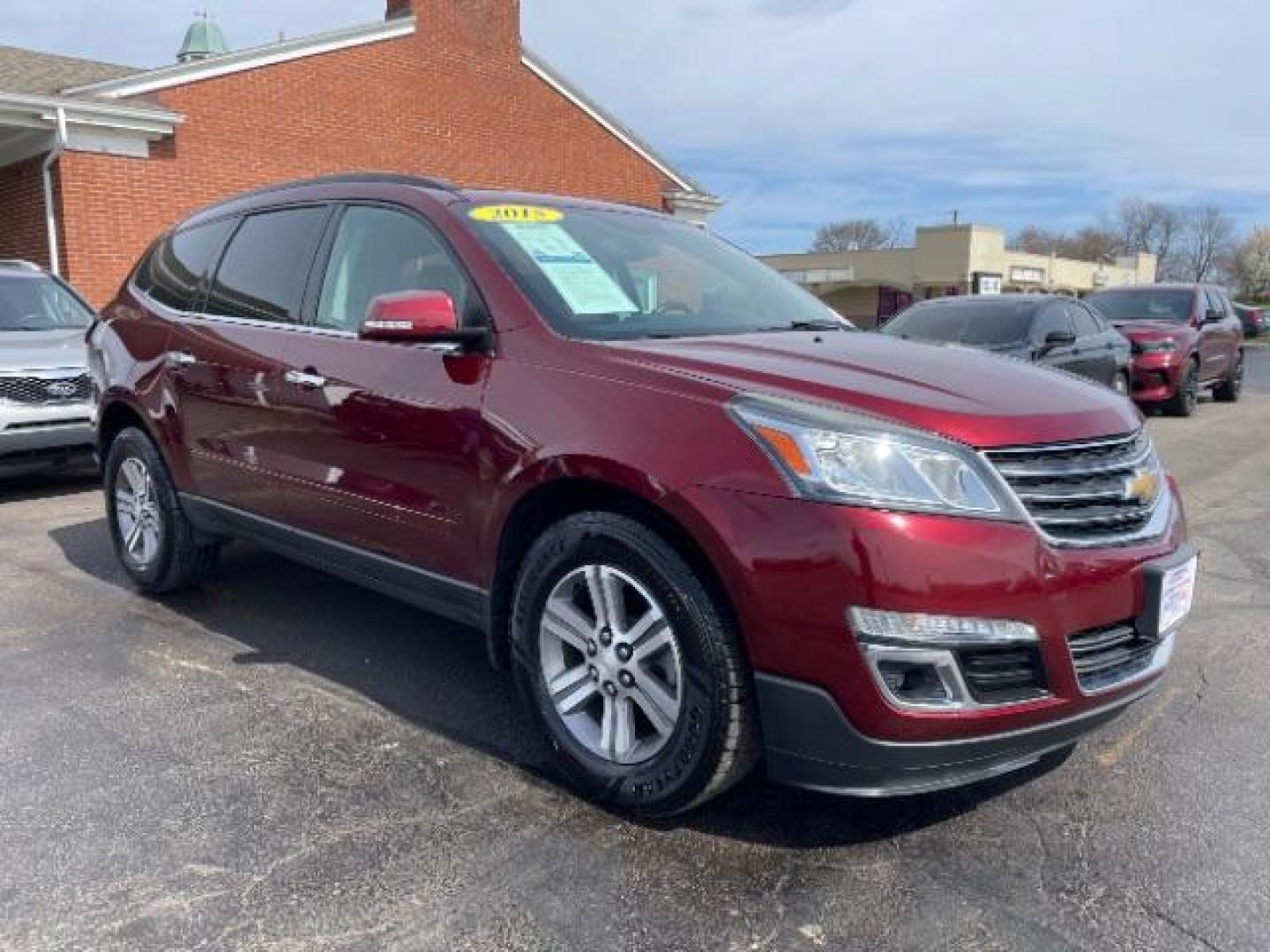 2015 Siren Red Tintcoat Chevrolet Traverse 2LT AWD (1GNKVHKD7FJ) with an 3.6L V6 DOHC 24V engine, 6-Speed Automatic transmission, located at 1099 N County Rd 25A, Troy, OH, 45373, (937) 908-9800, 40.057079, -84.212883 - Photo#0