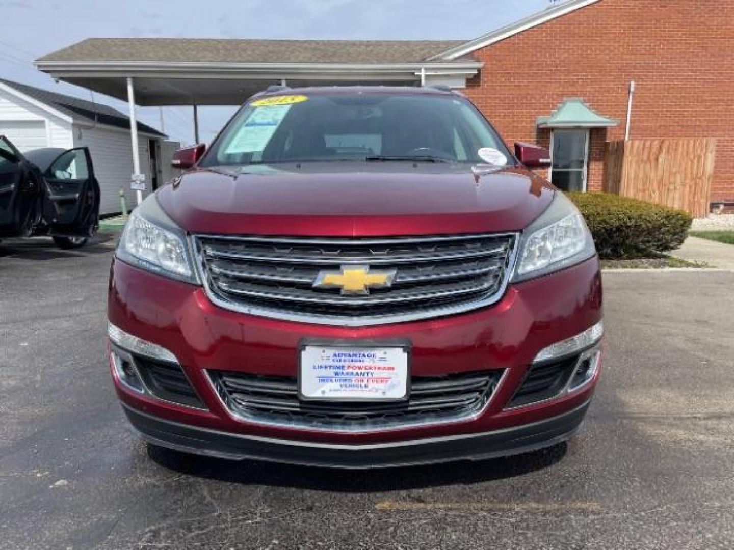 2015 Siren Red Tintcoat Chevrolet Traverse 2LT AWD (1GNKVHKD7FJ) with an 3.6L V6 DOHC 24V engine, 6-Speed Automatic transmission, located at 1099 N County Rd 25A, Troy, OH, 45373, (937) 908-9800, 40.057079, -84.212883 - Photo#2