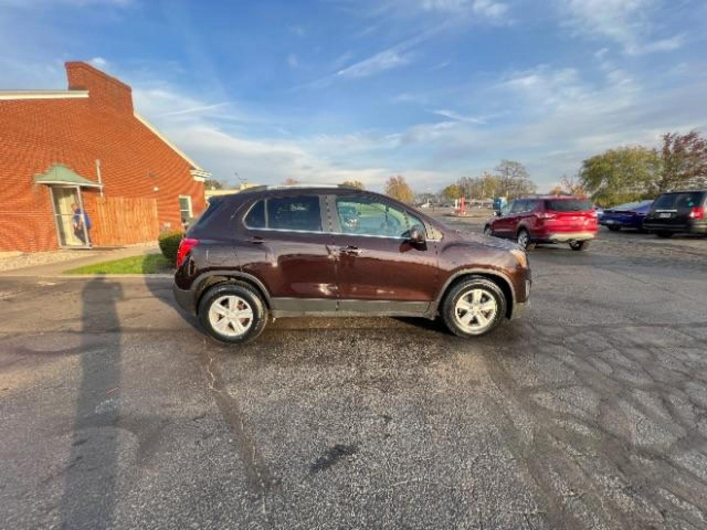 2015 Deep Espresso Metallic Chevrolet Trax LT FWD (KL7CJLSB0FB) with an 1.4L L4 DOHC 16V engine, 6-Speed Automatic transmission, located at 880 E. National Road, Vandalia, OH, 45377, (937) 908-9800, 39.891918, -84.183594 - Photo#4