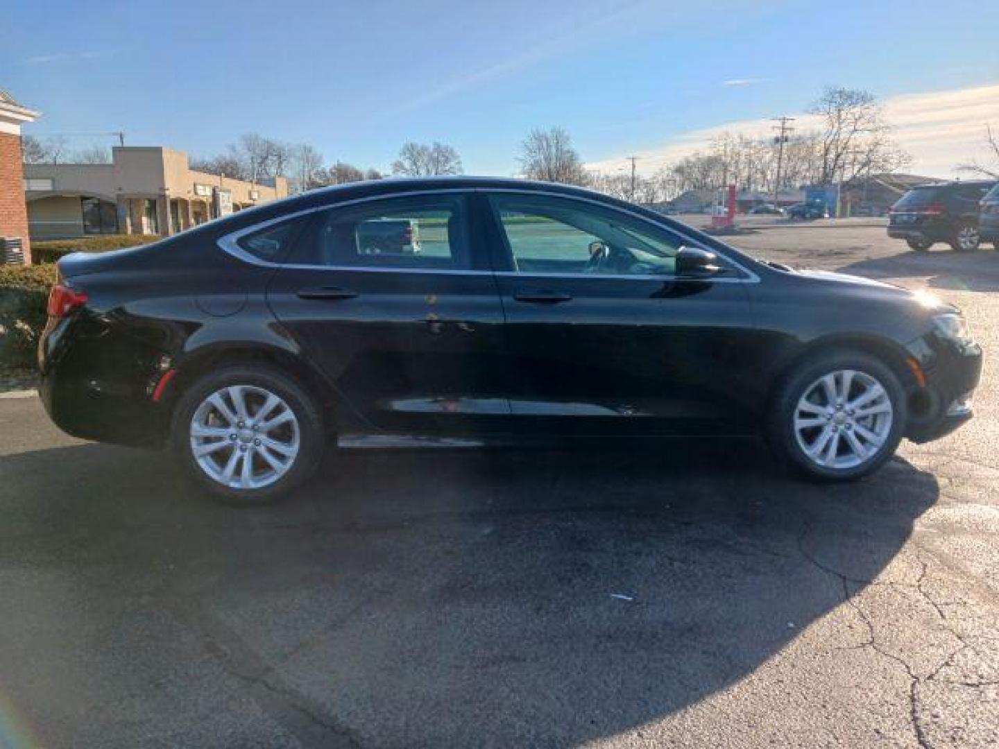 2015 Black Clearcoat Chrysler 200 Limited (1C3CCCAB3FN) with an 2.4L L4 DOHC 16V engine, 9-Speed Automatic transmission, located at 401 Woodman Dr, Riverside, OH, 45431, (937) 908-9800, 39.760899, -84.123421 - Photo#4