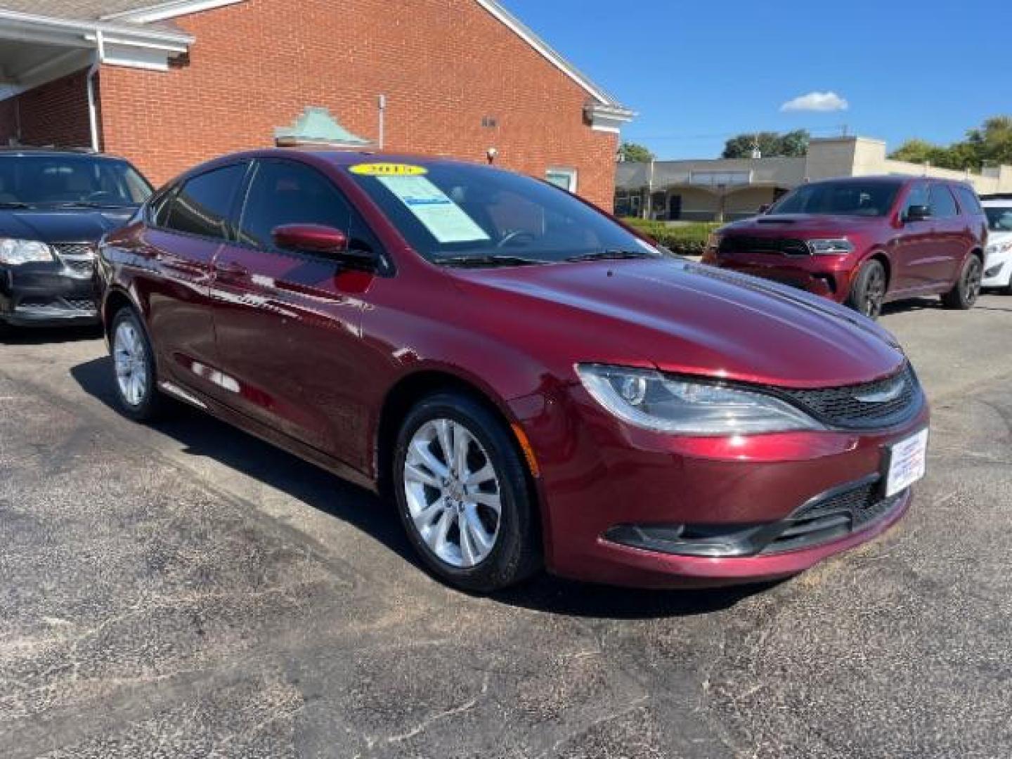 2015 Velvet Red Pearlcoat Chrysler 200 S (1C3CCCBB8FN) with an 2.4L L4 DOHC 16V engine, 9-Speed Automatic transmission, located at 1184 Kauffman Ave, Fairborn, OH, 45324, (937) 908-9800, 39.807072, -84.030914 - Photo#0