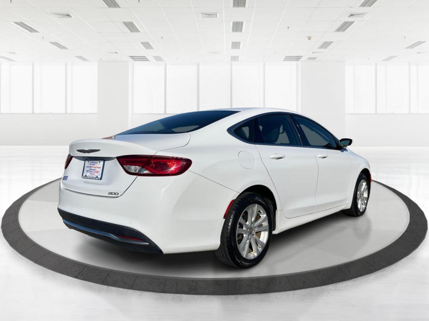 2015 Lunar White Tri-Coat Chrysler 200 Limited (1C3CCCAB1FN) with an 2.4L L4 DOHC 16V engine, 9-Speed Automatic transmission, located at 1184 Kauffman Ave, Fairborn, OH, 45324, (937) 908-9800, 39.807072, -84.030914 - Photo#2