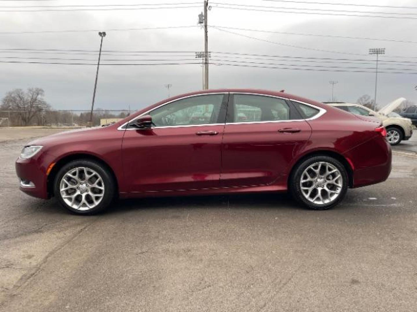 2015 Velvet Red Pearlcoat Chrysler 200 C AWD (1C3CCCEG1FN) with an 3.6L V6 DOHC 24V FFV engine, 9-Speed Automatic transmission, located at 4508 South Dixie Dr, Moraine, OH, 45439, (937) 908-9800, 39.689976, -84.218452 - Photo#2