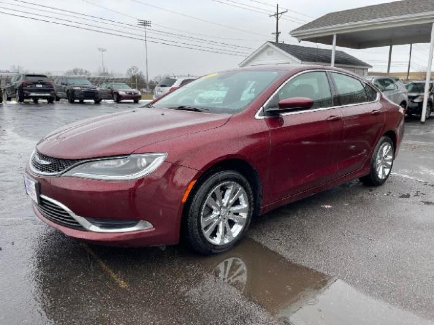 2015 Velvet Red Pearlcoat Chrysler 200 Limited (1C3CCCAB3FN) with an 2.4L L4 DOHC 16V engine, 9-Speed Automatic transmission, located at 401 Woodman Dr, Riverside, OH, 45431, (937) 908-9800, 39.760899, -84.123421 - Photo#1