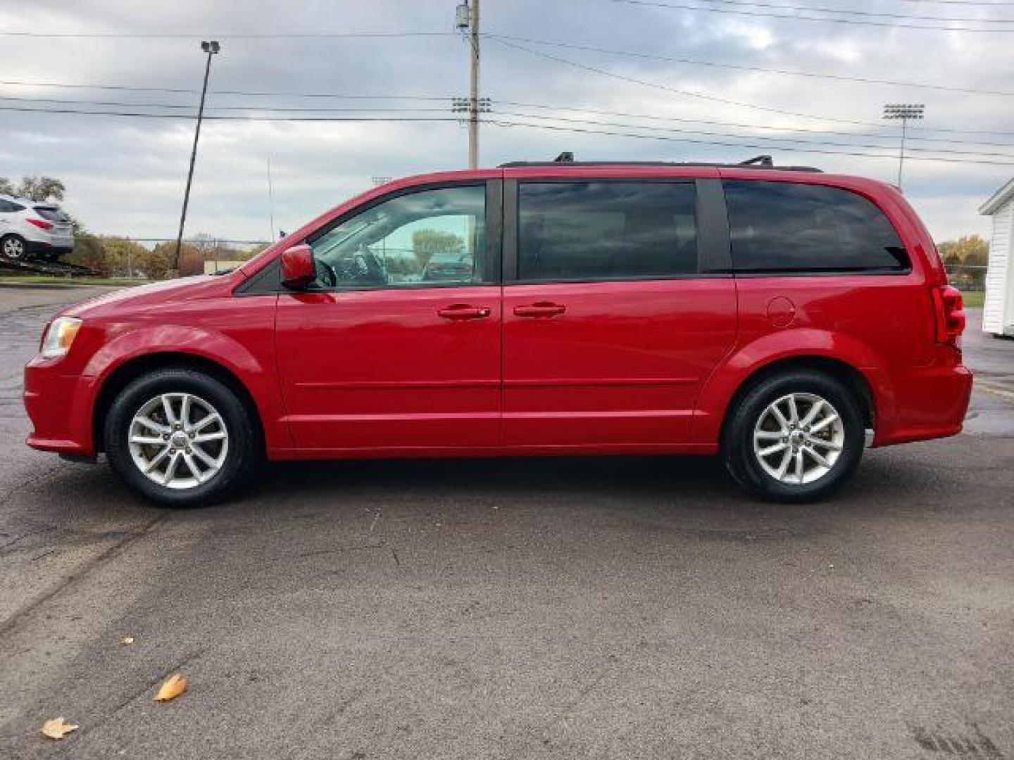 2015 Dp Cherry Red Crystal PC Dodge Grand Caravan SXT (2C4RDGCG1FR) with an 3.6L V6 DOHC 24V engine, 6-Speed Automatic transmission, located at 4508 South Dixie Dr, Moraine, OH, 45439, (937) 908-9800, 39.689976, -84.218452 - Photo#3