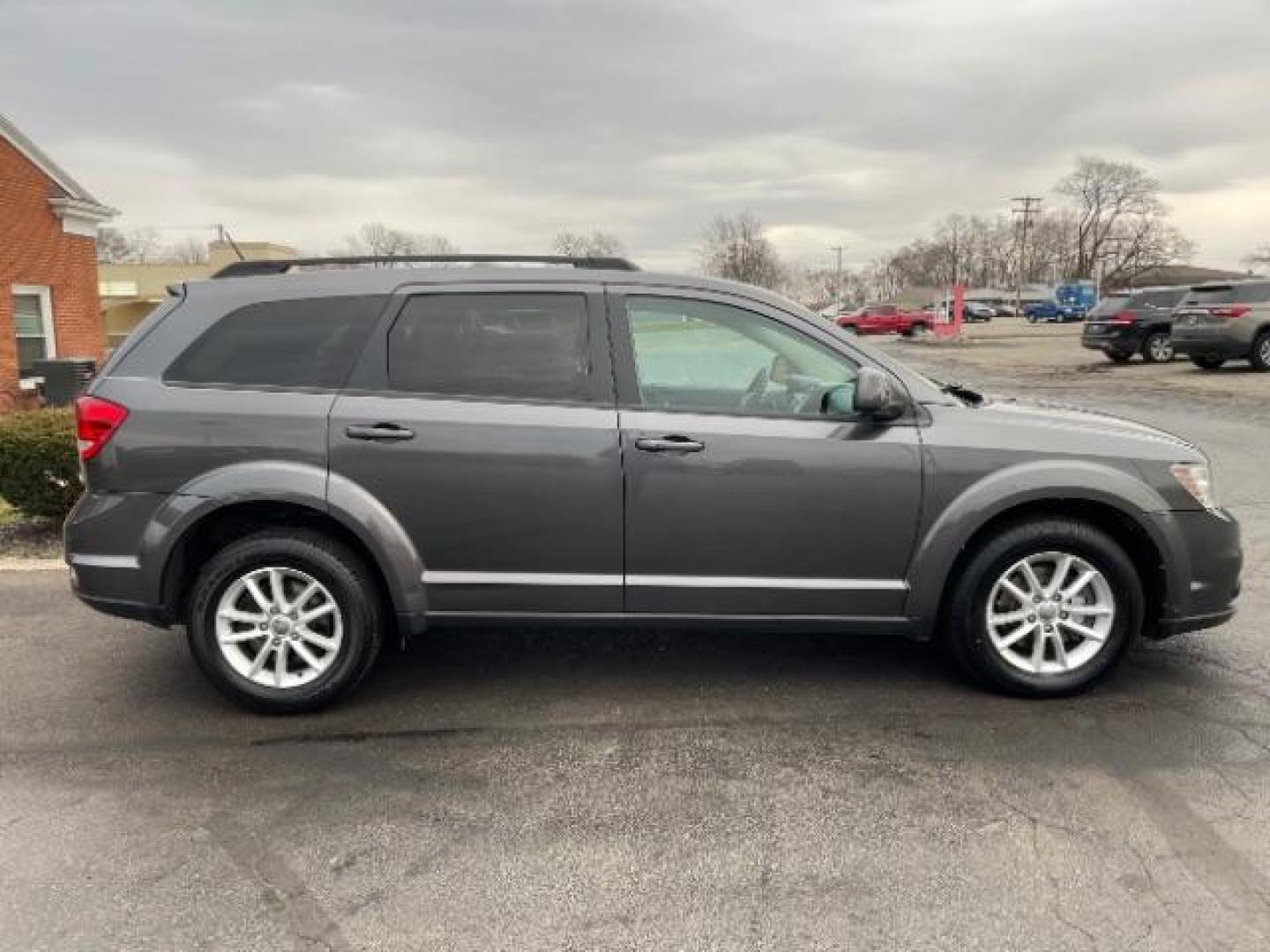 2015 Granite Crystal Met CC Dodge Journey SXT AWD (3C4PDDBG7FT) with an 3.6L V6 DOHC 24V engine, 6-Speed Automatic transmission, located at 1099 N County Rd 25A, Troy, OH, 45373, (937) 908-9800, 40.057079, -84.212883 - Photo#3