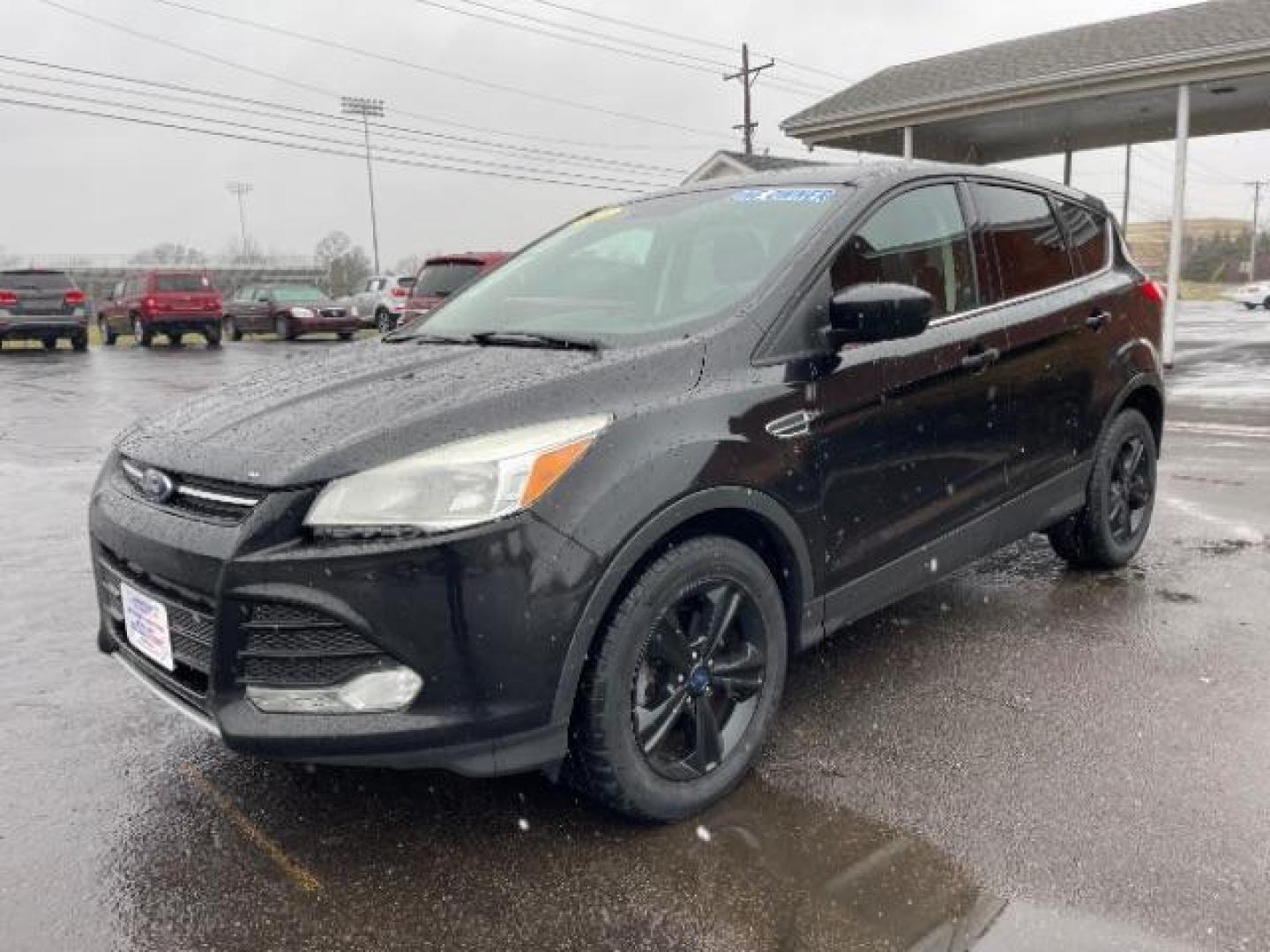 2015 Tuxedo Black Metallic Ford Escape SE FWD (1FMCU0G78FU) with an 2.5L L4 DOHC 16V engine, 6-Speed Automatic transmission, located at 1230 East Main St, Xenia, OH, 45385, (937) 908-9800, 39.688026, -83.910172 - Photo#1