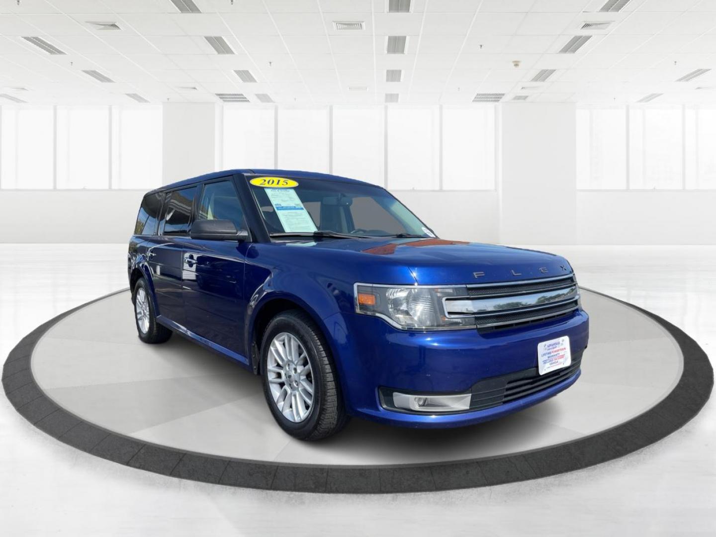 2015 Deep Impact Blue Metallic Ford Flex SEL AWD (2FMHK6C87FB) with an 3.5L V6 DOHC 24V engine, 6-Speed Automatic Overdrive transmission, located at 880 E. National Road, Vandalia, OH, 45377, (937) 908-9800, 39.891918, -84.183594 - Photo#0