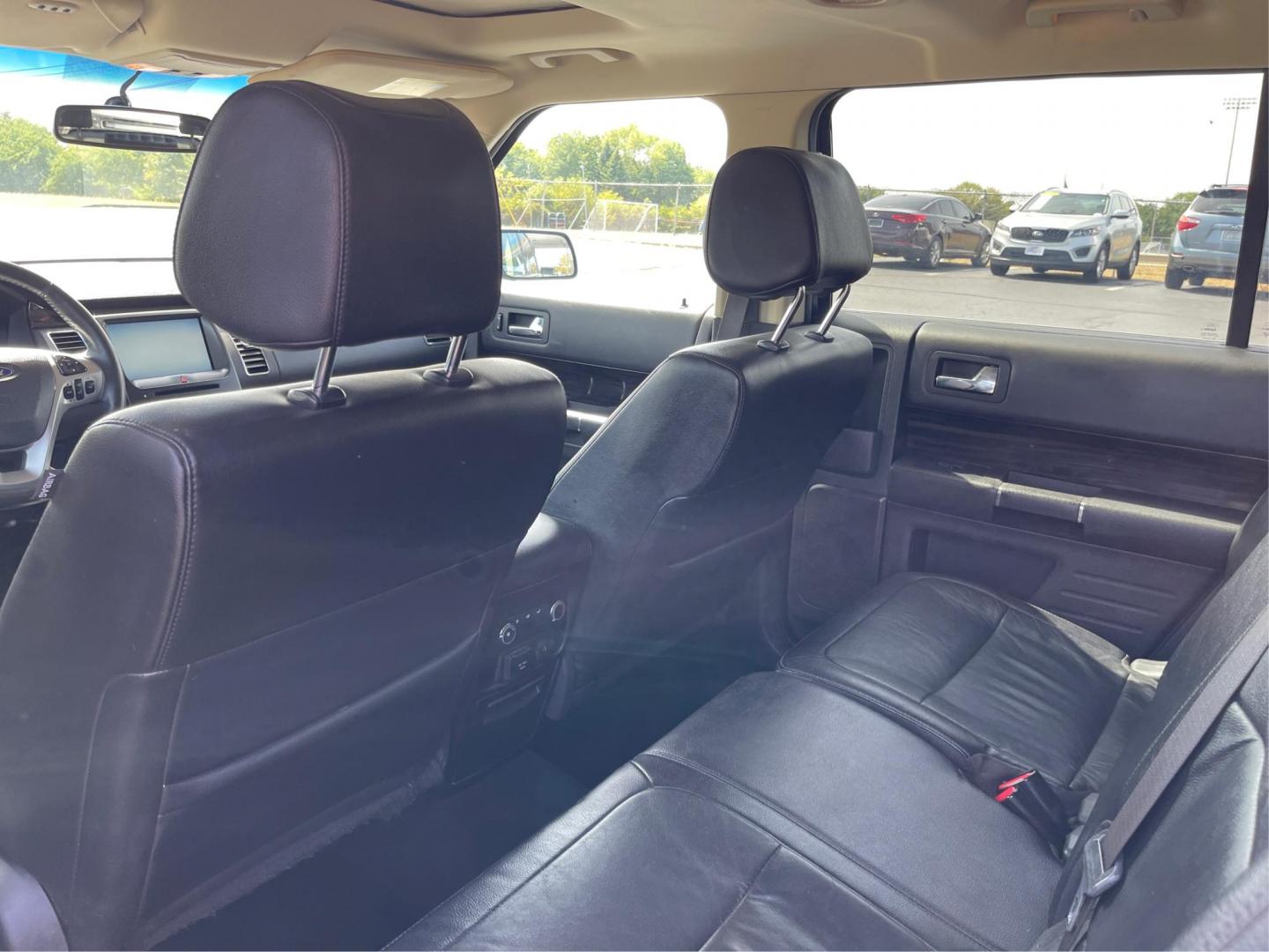 2015 Deep Impact Blue Metallic Ford Flex SEL AWD (2FMHK6C87FB) with an 3.5L V6 DOHC 24V engine, 6-Speed Automatic Overdrive transmission, located at 880 E. National Road, Vandalia, OH, 45377, (937) 908-9800, 39.891918, -84.183594 - Photo#9