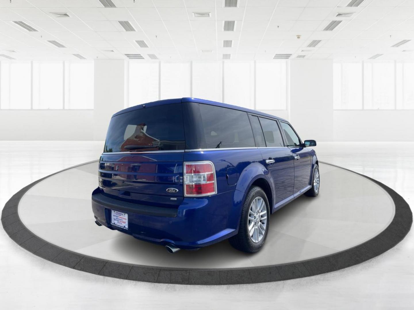 2015 Deep Impact Blue Metallic Ford Flex SEL AWD (2FMHK6C87FB) with an 3.5L V6 DOHC 24V engine, 6-Speed Automatic Overdrive transmission, located at 880 E. National Road, Vandalia, OH, 45377, (937) 908-9800, 39.891918, -84.183594 - Photo#2