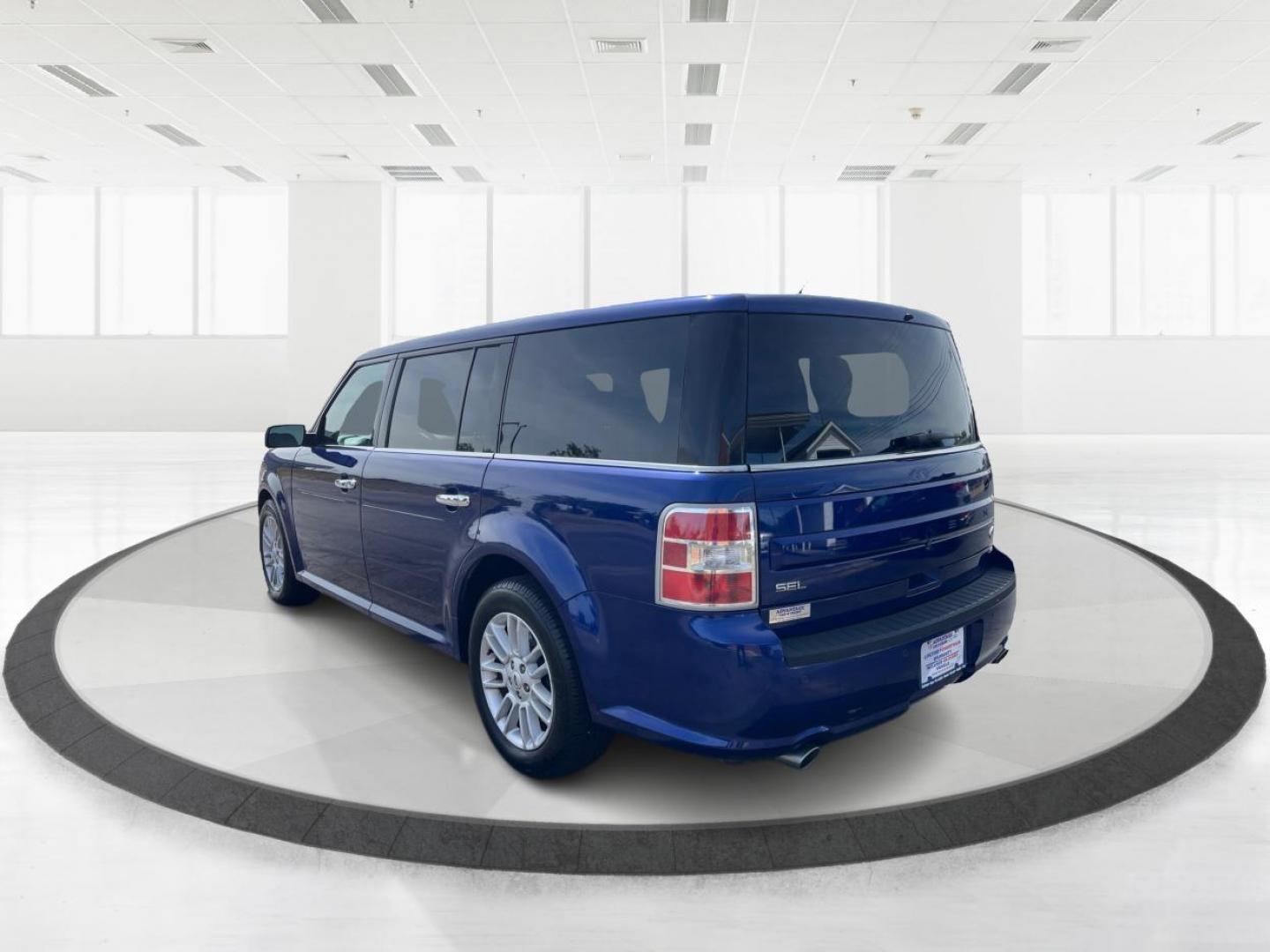 2015 Deep Impact Blue Metallic Ford Flex SEL AWD (2FMHK6C87FB) with an 3.5L V6 DOHC 24V engine, 6-Speed Automatic Overdrive transmission, located at 880 E. National Road, Vandalia, OH, 45377, (937) 908-9800, 39.891918, -84.183594 - Photo#4