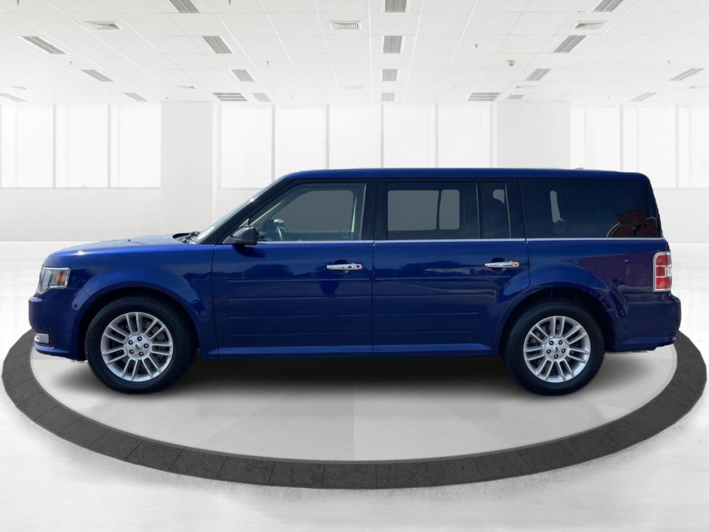 2015 Deep Impact Blue Metallic Ford Flex SEL AWD (2FMHK6C87FB) with an 3.5L V6 DOHC 24V engine, 6-Speed Automatic Overdrive transmission, located at 880 E. National Road, Vandalia, OH, 45377, (937) 908-9800, 39.891918, -84.183594 - Photo#5