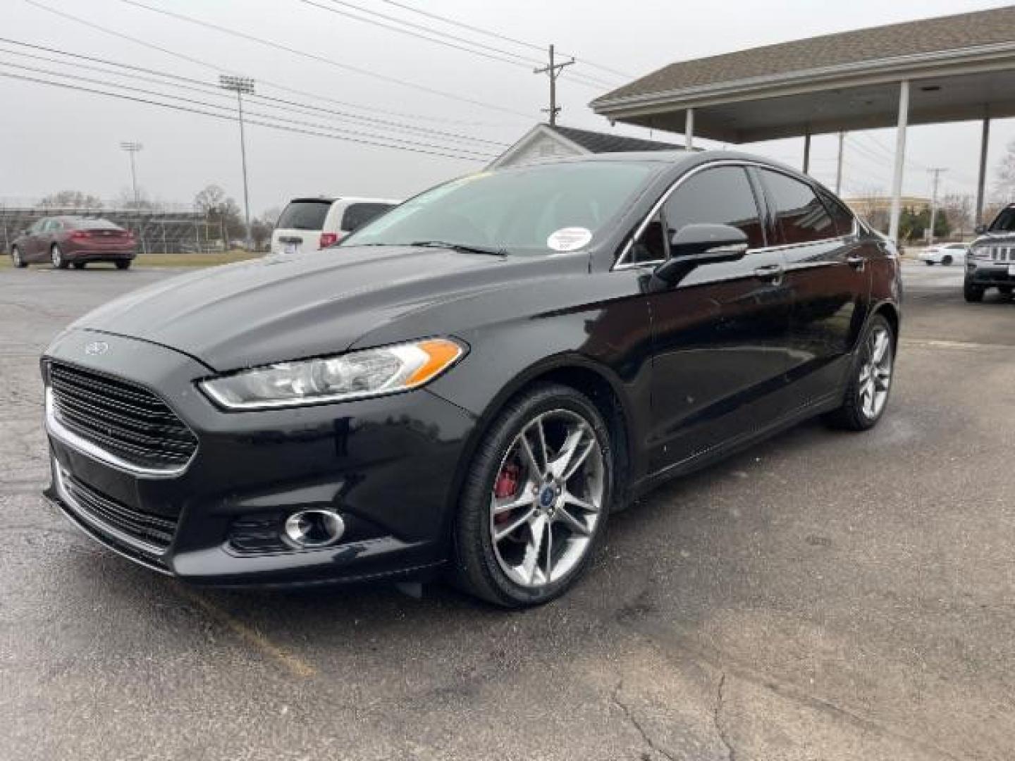 2015 Tuxedo Black Ford Fusion Titanium (3FA6P0K99FR) with an 2.0L L4 DOHC 16V engine, 6-Speed Automatic transmission, located at 401 Woodman Dr, Riverside, OH, 45431, (937) 908-9800, 39.760899, -84.123421 - Photo#1