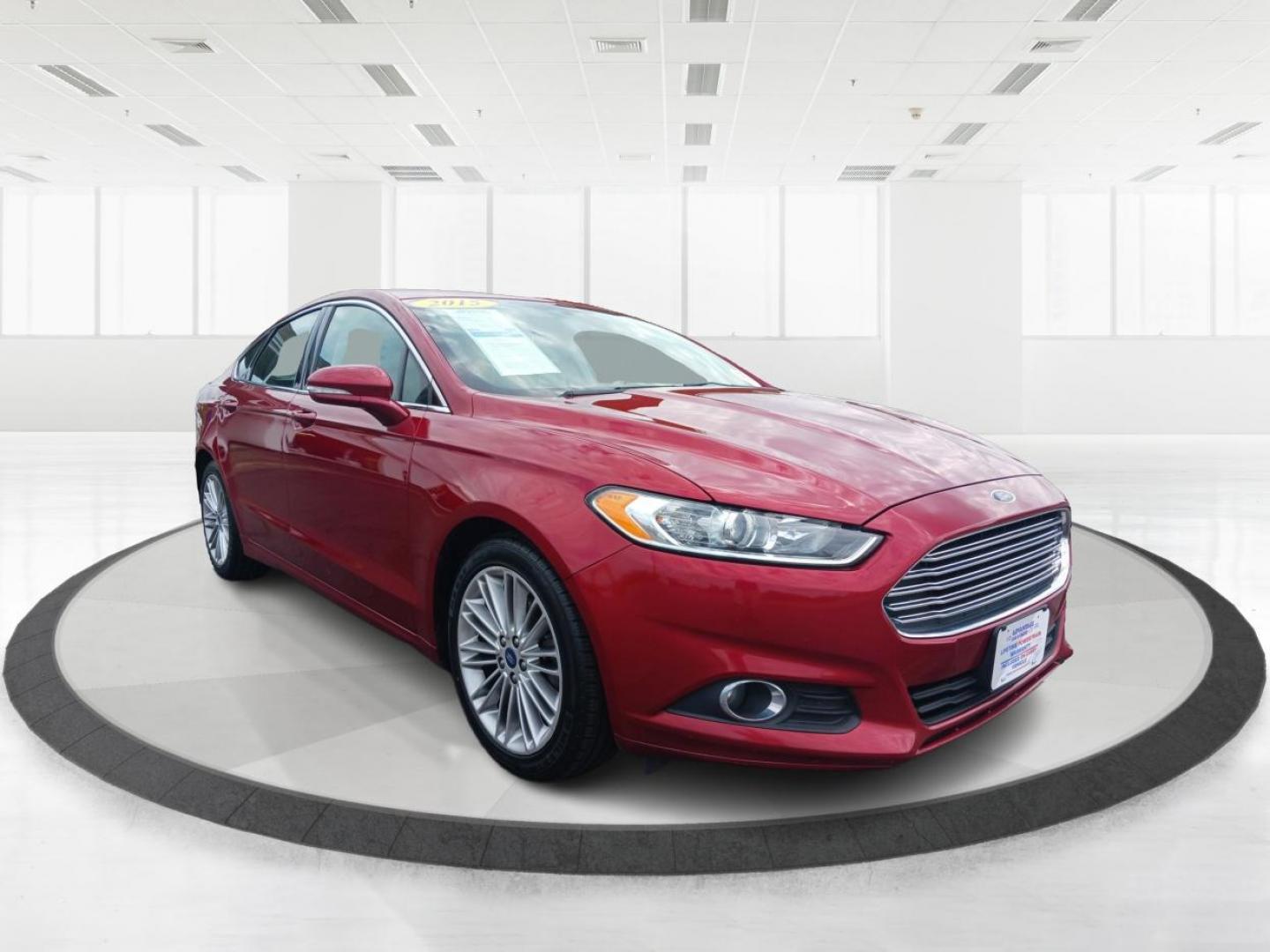 2015 Ruby Red Tinted CC Ford Fusion (3FA6P0HD2FR) with an 1.5L L4 DOHC 16V engine, 6-Speed Automatic transmission, located at 401 Woodman Dr, Riverside, OH, 45431, (937) 908-9800, 39.760899, -84.123421 - Photo#0