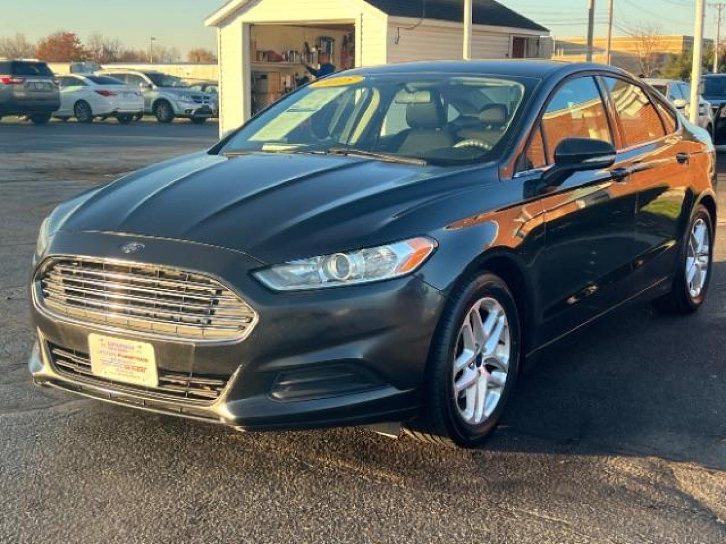 2015 Tuxedo Black Ford Fusion SE (3FA6P0H73FR) with an 2.5L L4 DOHC 16V engine, 6-Speed Automatic transmission, located at 1230 East Main St, Xenia, OH, 45385, (937) 908-9800, 39.688026, -83.910172 - Photo#2