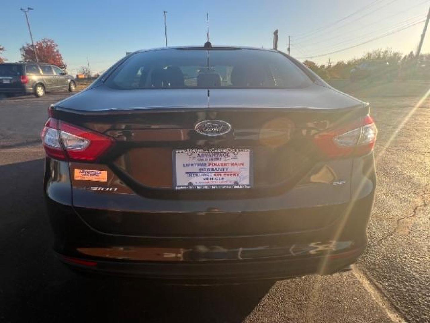 2015 Tuxedo Black Ford Fusion SE (3FA6P0H73FR) with an 2.5L L4 DOHC 16V engine, 6-Speed Automatic transmission, located at 1230 East Main St, Xenia, OH, 45385, (937) 908-9800, 39.688026, -83.910172 - Photo#4