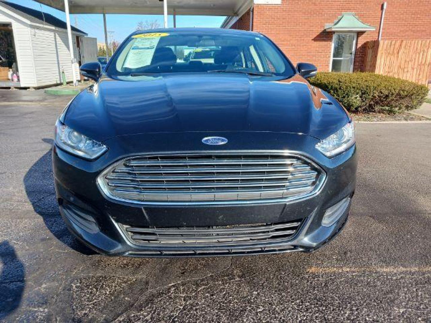 2015 Tuxedo Black Ford Fusion SE (3FA6P0H7XFR) with an 2.5L L4 DOHC 16V engine, 6-Speed Automatic transmission, located at 1230 East Main St, Xenia, OH, 45385, (937) 908-9800, 39.688026, -83.910172 - Photo#1