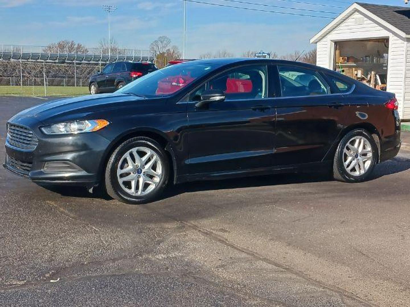 2015 Tuxedo Black Ford Fusion SE (3FA6P0H7XFR) with an 2.5L L4 DOHC 16V engine, 6-Speed Automatic transmission, located at 1230 East Main St, Xenia, OH, 45385, (937) 908-9800, 39.688026, -83.910172 - Photo#2