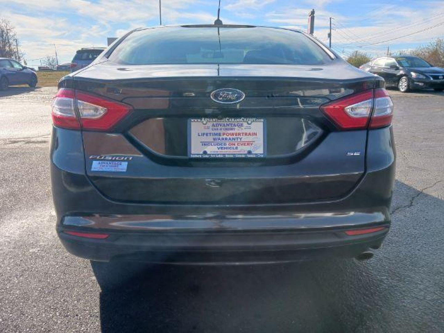 2015 Tuxedo Black Ford Fusion SE (3FA6P0H7XFR) with an 2.5L L4 DOHC 16V engine, 6-Speed Automatic transmission, located at 1230 East Main St, Xenia, OH, 45385, (937) 908-9800, 39.688026, -83.910172 - Photo#5