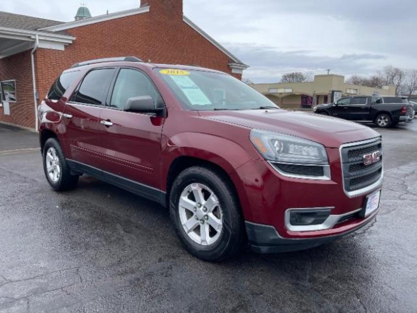 2015 Crimson Red Tincoat GMC Acadia SLE-2 AWD (1GKKVPKDXFJ) with an 3.6L V6 DOHC 24V engine, 6-Speed Automatic transmission, located at 1099 N County Rd 25A, Troy, OH, 45373, (937) 908-9800, 40.057079, -84.212883 - Photo#0