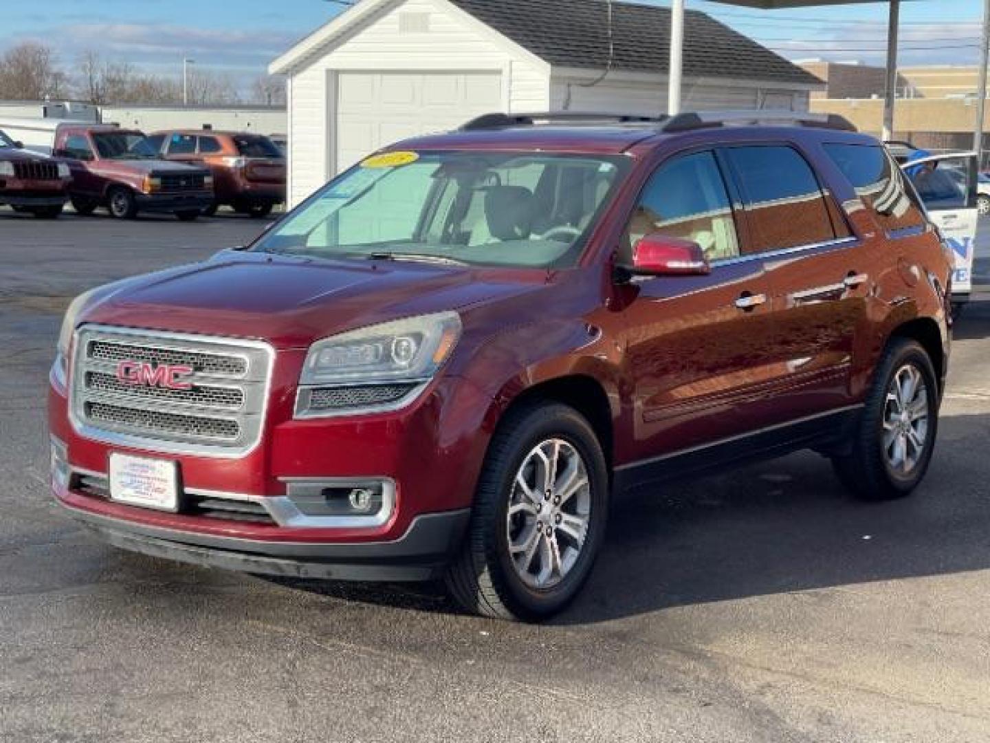 2015 Crimson Red Tincoat GMC Acadia SLT-1 FWD (1GKKRRKD7FJ) with an 3.6L V6 DOHC 24V engine, 6-Speed Automatic transmission, located at 4508 South Dixie Dr, Moraine, OH, 45439, (937) 908-9800, 39.689976, -84.218452 - Photo#1