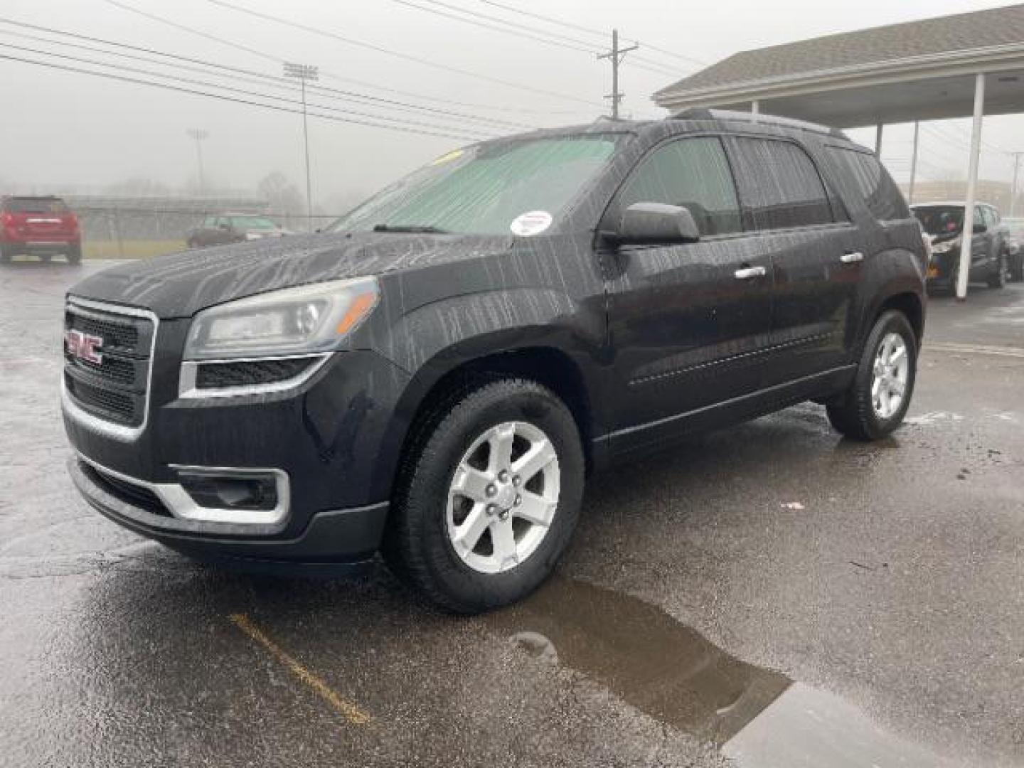 2015 Carbon Black Metallic GMC Acadia SLE-2 FWD (1GKKRPKD3FJ) with an 3.6L V6 DOHC 24V engine, 6-Speed Automatic transmission, located at 1099 N County Rd 25A, Troy, OH, 45373, (937) 908-9800, 40.057079, -84.212883 - Photo#1