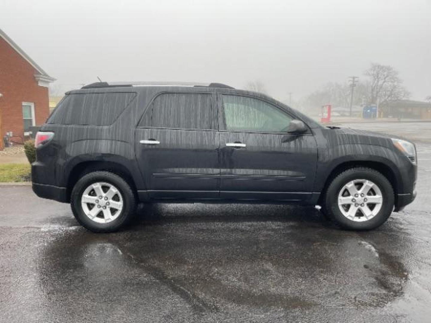 2015 Carbon Black Metallic GMC Acadia SLE-2 FWD (1GKKRPKD3FJ) with an 3.6L V6 DOHC 24V engine, 6-Speed Automatic transmission, located at 1099 N County Rd 25A, Troy, OH, 45373, (937) 908-9800, 40.057079, -84.212883 - Photo#2