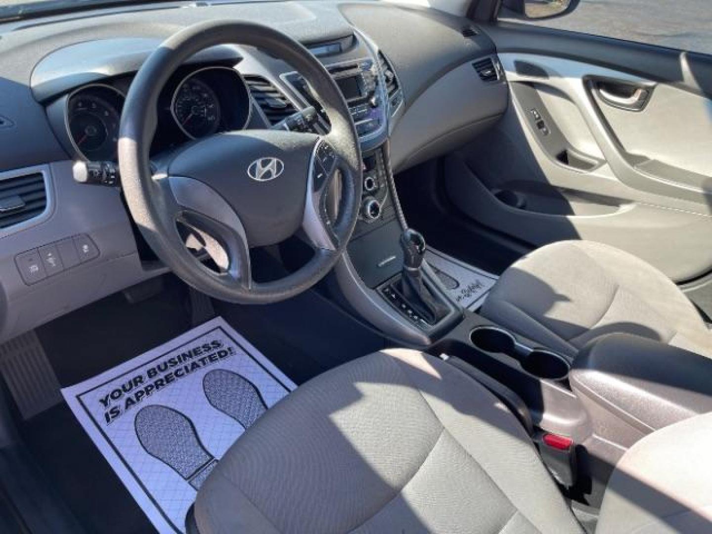 2015 Symphony Silver Hyundai Elantra SE 6AT (5NPDH4AE7FH) with an 1.8L L4 DOHC 16V engine, 6-Speed Automatic transmission, located at 880 E. National Road, Vandalia, OH, 45377, (937) 908-9800, 39.891918, -84.183594 - Photo#6