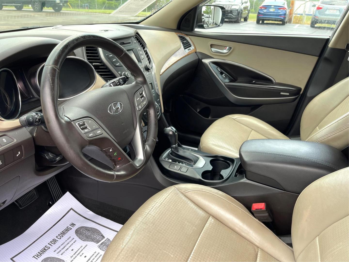 2015 Mineral Gray Hyundai Santa Fe (5XYZUDLB8FG) with an 2.4L L4 DOHC 16V engine, 6-Speed Automatic transmission, located at 880 E. National Road, Vandalia, OH, 45377, (937) 908-9800, 39.891918, -84.183594 - Photo#8