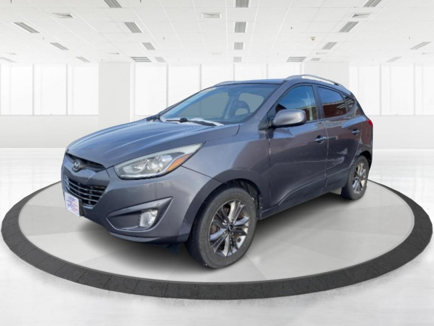 2015 Graphite Gray Metallic Hyundai Tucson (KM8JUCAG4FU) with an 2.4L L4 DOHC 16V engine, 6-Speed Automatic transmission, located at 1230 East Main St, Xenia, OH, 45385, (937) 908-9800, 39.688026, -83.910172 - Photo#5