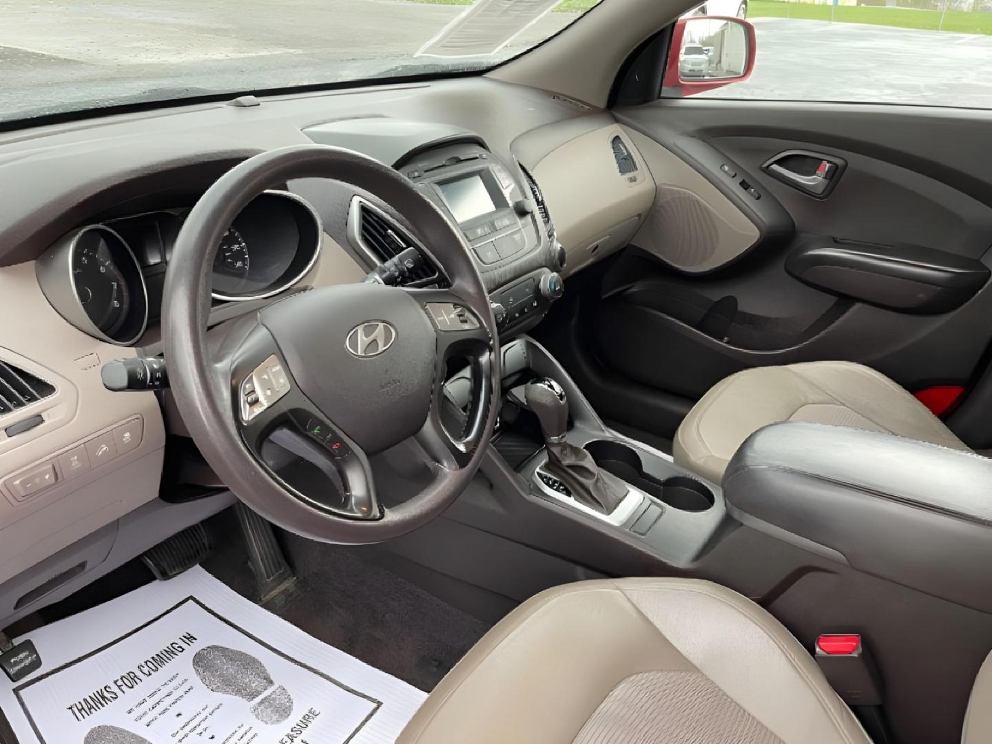 2015 Garnet Red Mica Hyundai Tucson (KM8JTCAF6FU) with an 2.0L L4 DOHC 16V engine, 6-Speed Automatic transmission, located at 1951 S Dayton Lakeview Rd., New Carlisle, OH, 45344, (937) 908-9800, 39.890999, -84.050255 - Photo#6