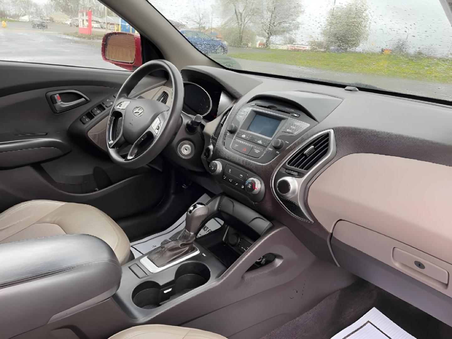 2015 Garnet Red Mica Hyundai Tucson (KM8JTCAF6FU) with an 2.0L L4 DOHC 16V engine, 6-Speed Automatic transmission, located at 1951 S Dayton Lakeview Rd., New Carlisle, OH, 45344, (937) 908-9800, 39.890999, -84.050255 - Photo#8