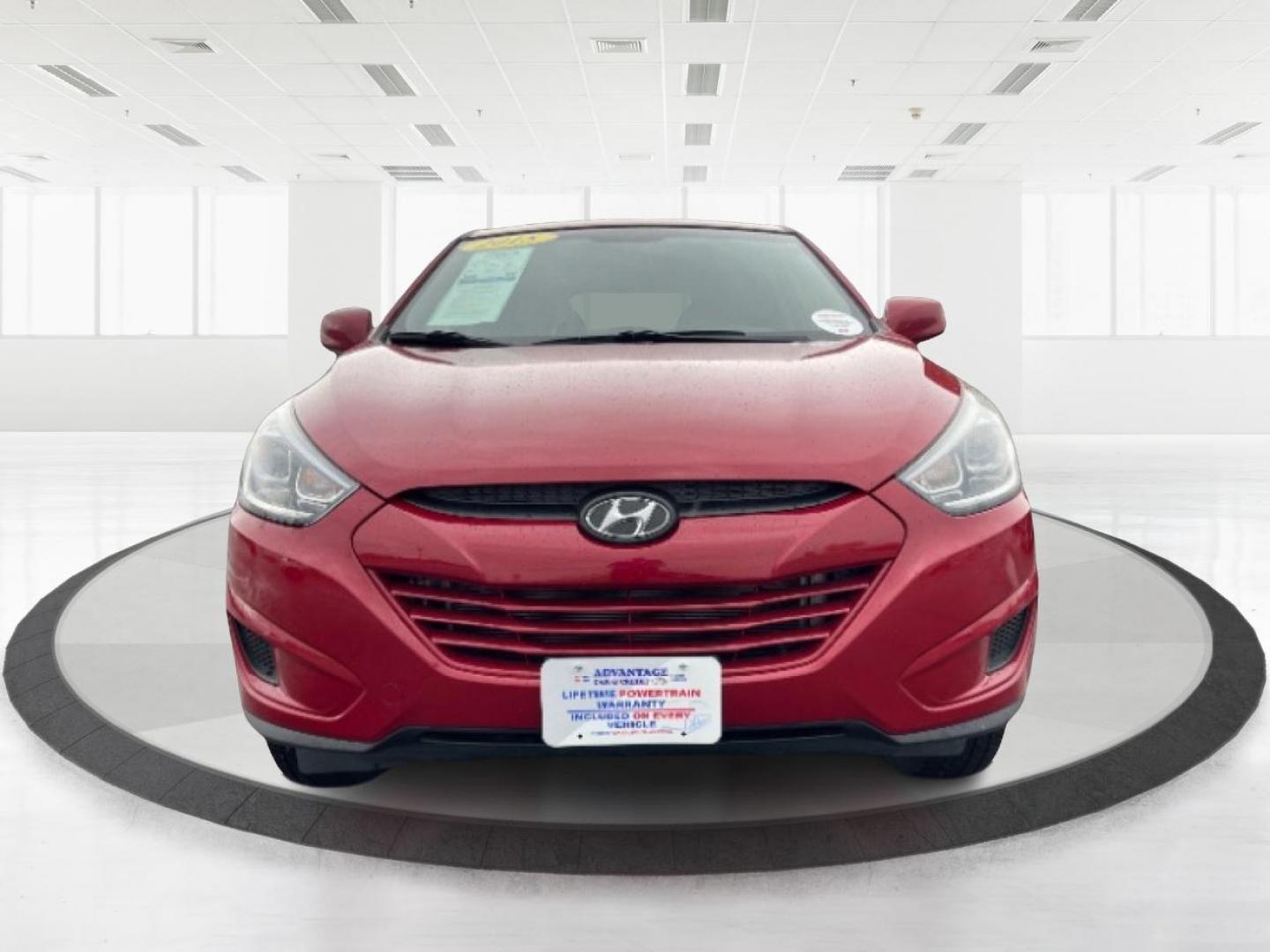 2015 Garnet Red Mica Hyundai Tucson (KM8JTCAF6FU) with an 2.0L L4 DOHC 16V engine, 6-Speed Automatic transmission, located at 1951 S Dayton Lakeview Rd., New Carlisle, OH, 45344, (937) 908-9800, 39.890999, -84.050255 - Photo#4