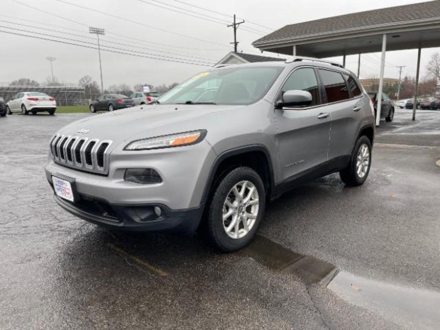 2015 Billet Silver Metallic CC Jeep Cherokee Latitude 4WD (1C4PJMCBXFW) with an 2.4L L4 DOHC 16V engine, 9-Speed Automatic transmission, located at 1099 N County Rd 25A, Troy, OH, 45373, (937) 908-9800, 40.057079, -84.212883 - Photo#1