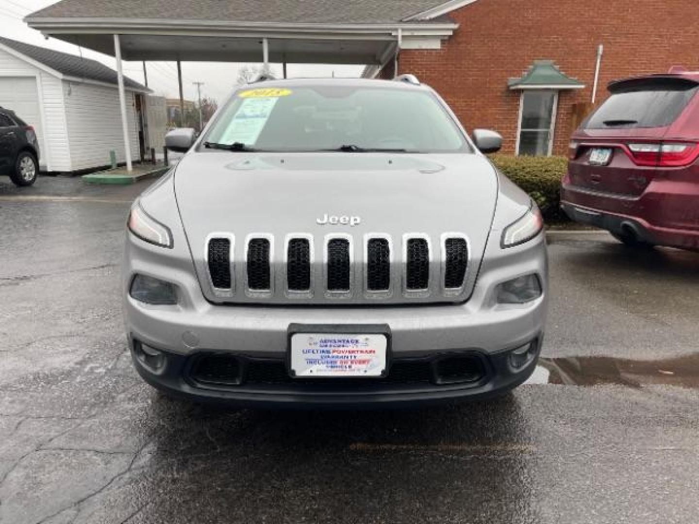 2015 Billet Silver Metallic CC Jeep Cherokee Latitude 4WD (1C4PJMCBXFW) with an 2.4L L4 DOHC 16V engine, 9-Speed Automatic transmission, located at 1099 N County Rd 25A, Troy, OH, 45373, (937) 908-9800, 40.057079, -84.212883 - Photo#3