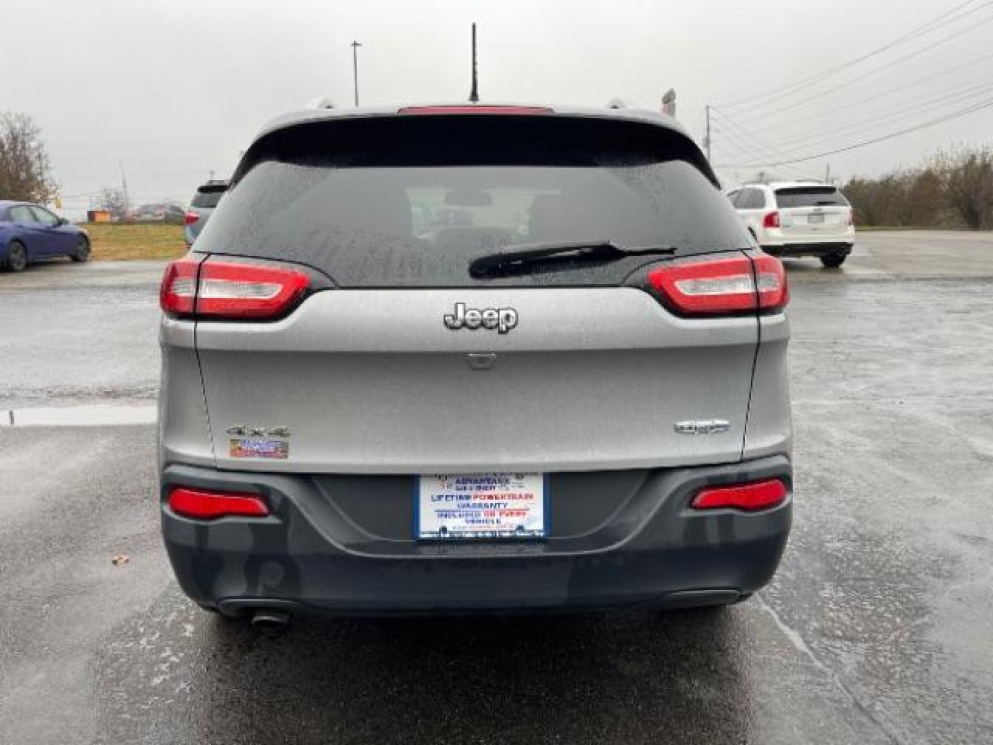 2015 Billet Silver Metallic CC Jeep Cherokee Latitude 4WD (1C4PJMCBXFW) with an 2.4L L4 DOHC 16V engine, 9-Speed Automatic transmission, located at 1099 N County Rd 25A, Troy, OH, 45373, (937) 908-9800, 40.057079, -84.212883 - Photo#4