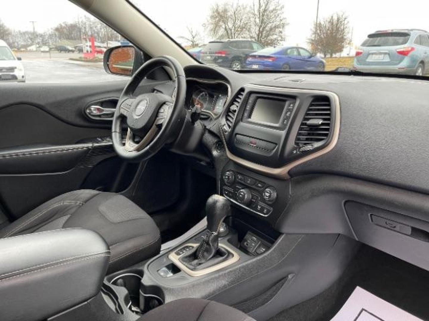 2015 Billet Silver Metallic CC Jeep Cherokee Latitude 4WD (1C4PJMCBXFW) with an 2.4L L4 DOHC 16V engine, 9-Speed Automatic transmission, located at 1099 N County Rd 25A, Troy, OH, 45373, (937) 908-9800, 40.057079, -84.212883 - Photo#7