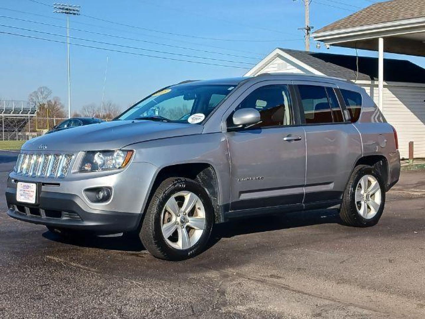 2015 Billet Silver Metallic Clear Coat Jeep Compass Latitude 4WD (1C4NJDEB0FD) with an 2.4L L4 DOHC 16V engine, 6-Speed Automatic transmission, located at 1184 Kauffman Ave, Fairborn, OH, 45324, (937) 908-9800, 39.807072, -84.030914 - Photo#2