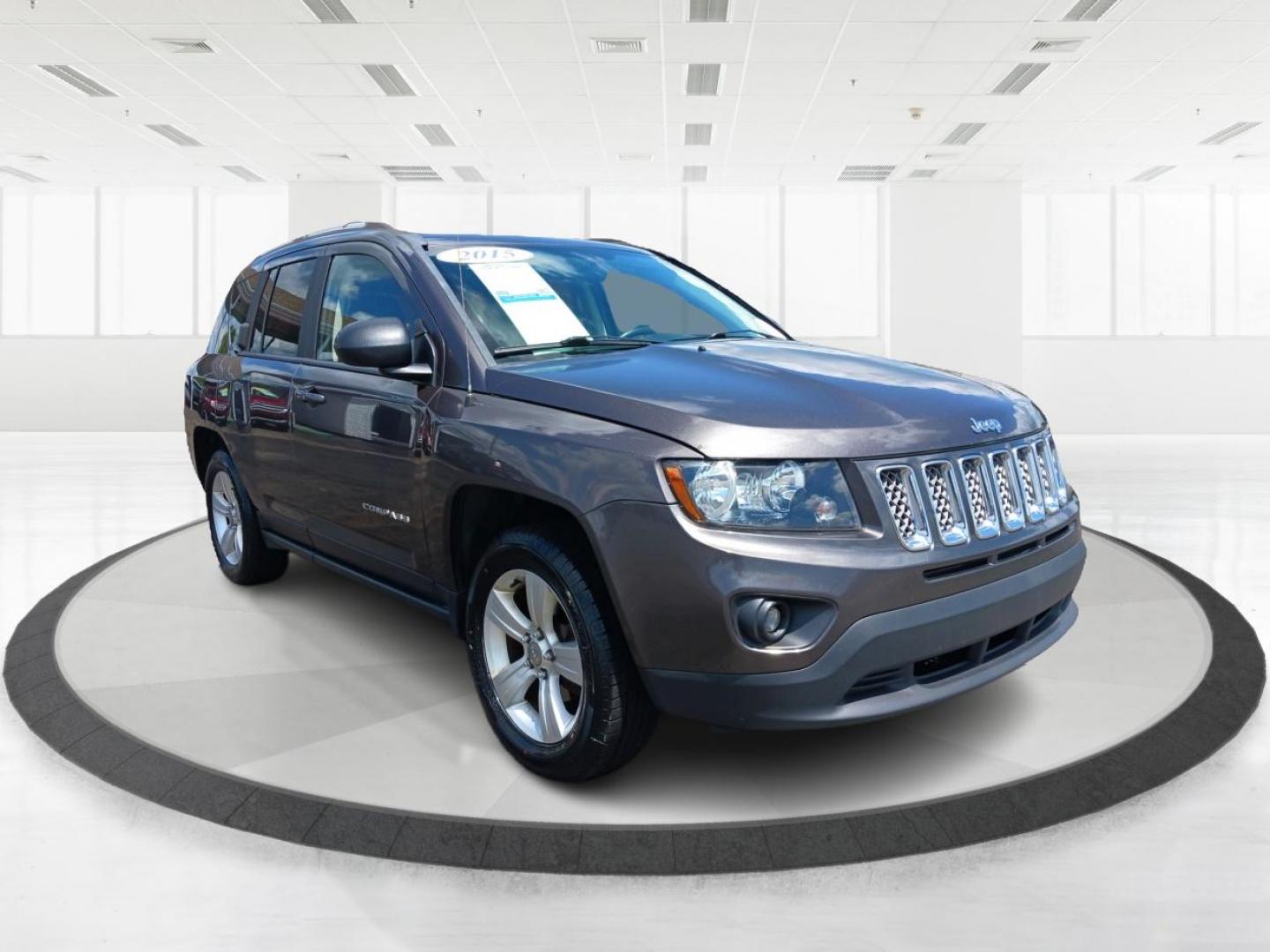 2015 Granite Crystal Metallic Clear Coat Jeep Compass (1C4NJDEB4FD) with an 2.4L L4 DOHC 16V engine, 6-Speed Automatic transmission, located at 1099 N County Rd 25A, Troy, OH, 45373, (937) 908-9800, 40.057079, -84.212883 - Photo#0