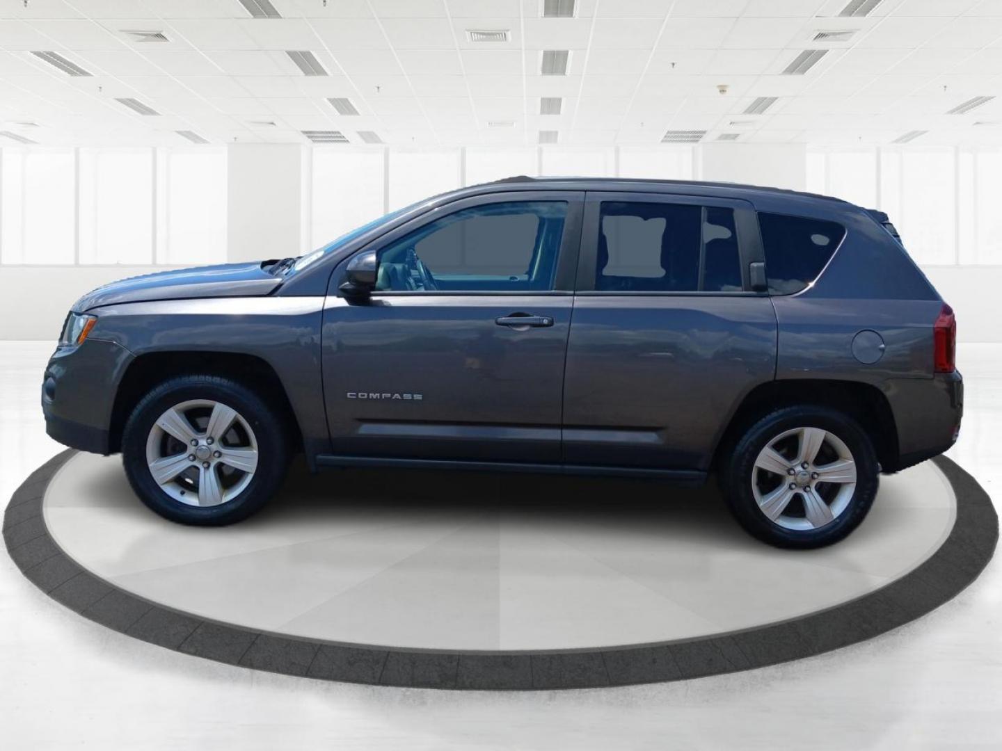 2015 Granite Crystal Metallic Clear Coat Jeep Compass (1C4NJDEB4FD) with an 2.4L L4 DOHC 16V engine, 6-Speed Automatic transmission, located at 1099 N County Rd 25A, Troy, OH, 45373, (937) 908-9800, 40.057079, -84.212883 - Photo#5