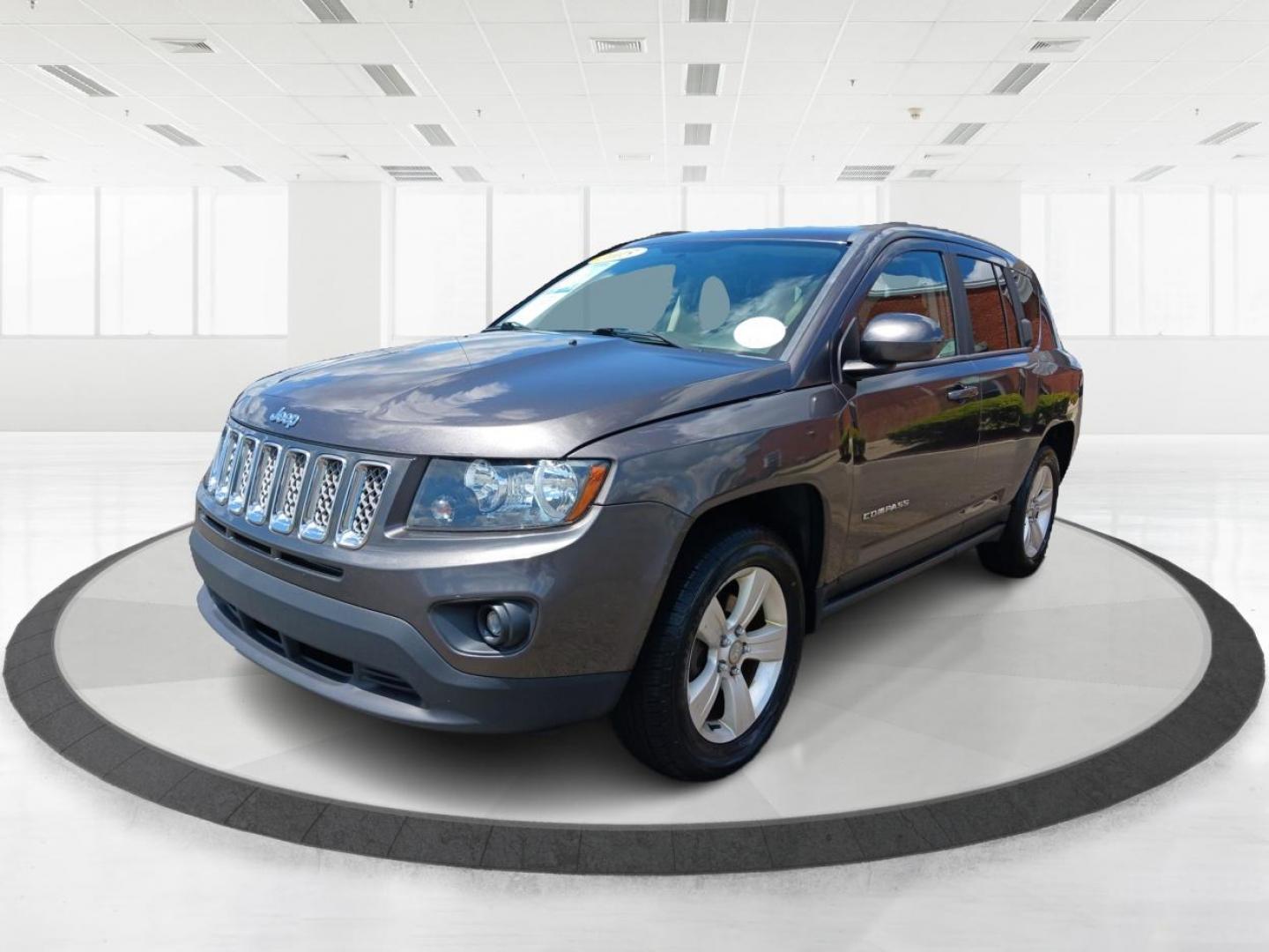 2015 Granite Crystal Metallic Clear Coat Jeep Compass (1C4NJDEB4FD) with an 2.4L L4 DOHC 16V engine, 6-Speed Automatic transmission, located at 1099 N County Rd 25A, Troy, OH, 45373, (937) 908-9800, 40.057079, -84.212883 - Photo#7