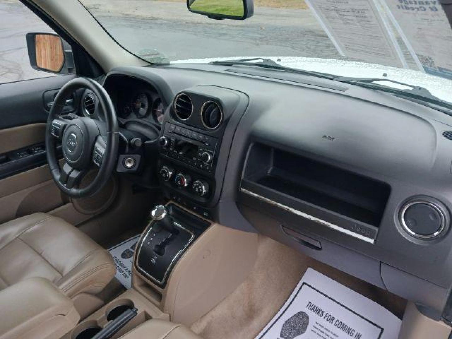 2015 Bright White Clearcoat Jeep Patriot Latitude 2WD (1C4NJPFA8FD) with an 2.0L L4 DOHC 16V engine, located at 4508 South Dixie Dr, Moraine, OH, 45439, (937) 908-9800, 39.689976, -84.218452 - Photo#8