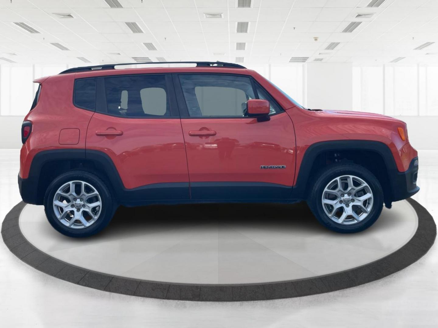 2015 Omaha Orange Jeep Renegade Latitude 4WD (ZACCJBBT2FP) with an 2.4L L4 engine, 6-Speed Manual transmission, located at 1951 S Dayton Lakeview Rd., New Carlisle, OH, 45344, (937) 908-9800, 39.890999, -84.050255 - Photo#1