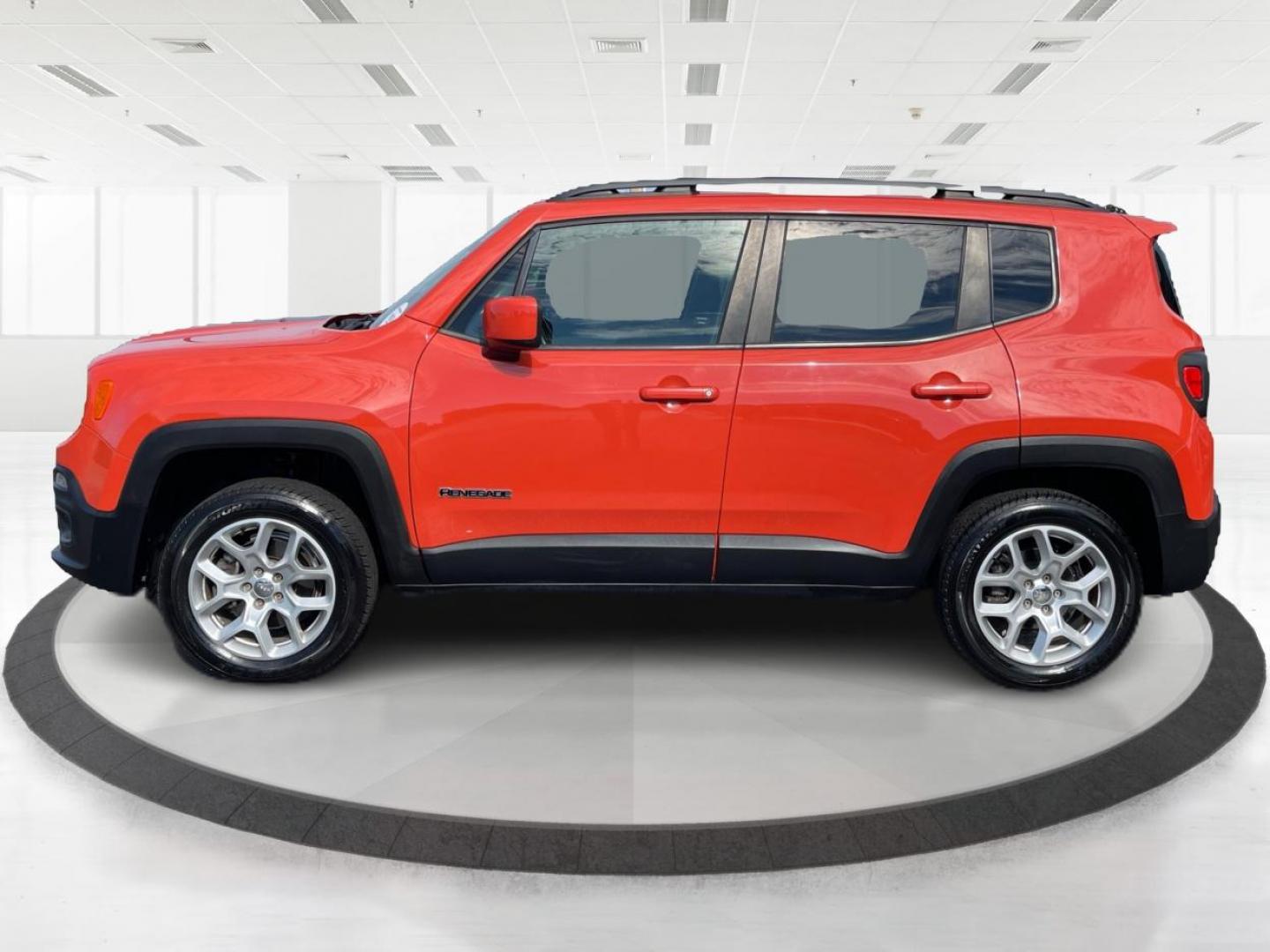 2015 Omaha Orange Jeep Renegade Latitude 4WD (ZACCJBBT2FP) with an 2.4L L4 engine, 6-Speed Manual transmission, located at 1951 S Dayton Lakeview Rd., New Carlisle, OH, 45344, (937) 908-9800, 39.890999, -84.050255 - Photo#5