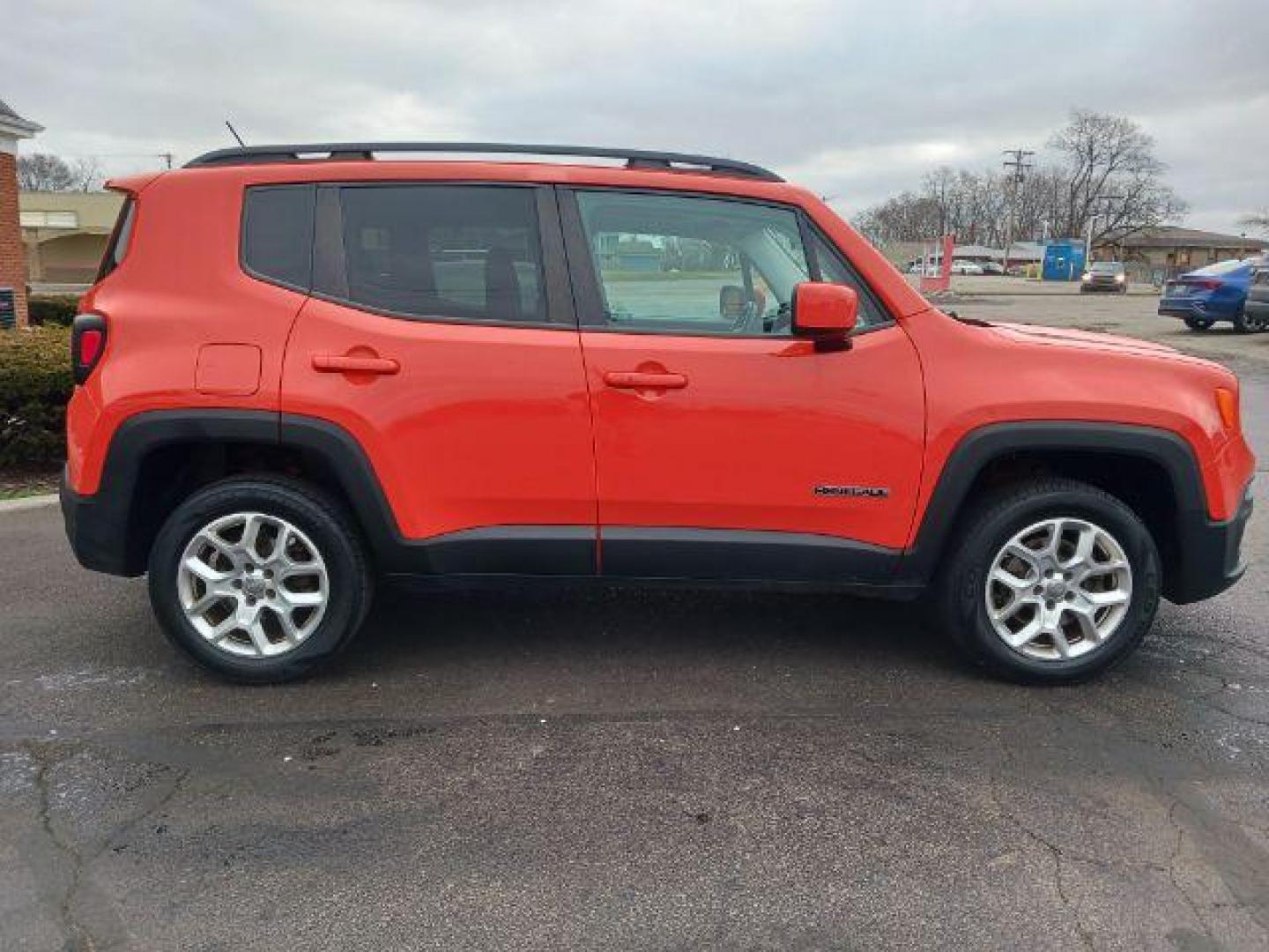 2015 Omaha Orange Jeep Renegade Latitude 4WD (ZACCJBBT1FP) with an 2.4L L4 DOHC 16V engine, 6-Speed Manual transmission, located at 401 Woodman Dr, Riverside, OH, 45431, (937) 908-9800, 39.760899, -84.123421 - Photo#4